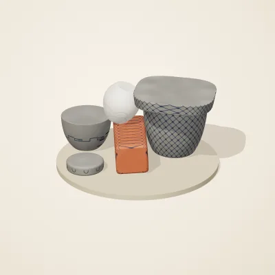 The six parts of Roman Mosaic No. 23 in a loose pile on a round stand