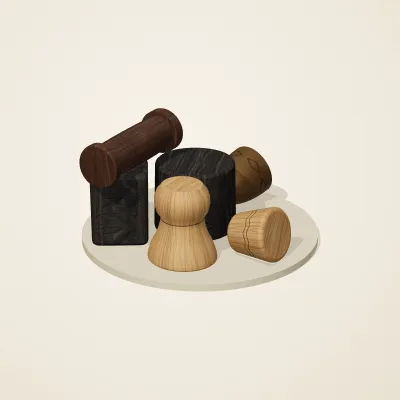 The six parts of Yoruba Woodcraft No. 13 in a loose pile on a round stand