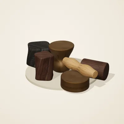 The six parts of Yoruba Woodcraft No. 17 in a loose pile on a round stand