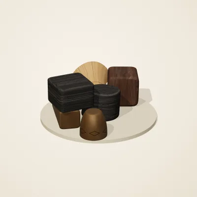 The six parts of Yoruba Woodcraft No. 30 in a loose pile on a round stand