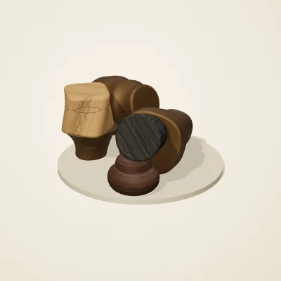 The six parts of Yoruba Woodcraft No. 33 in a loose pile on a round stand