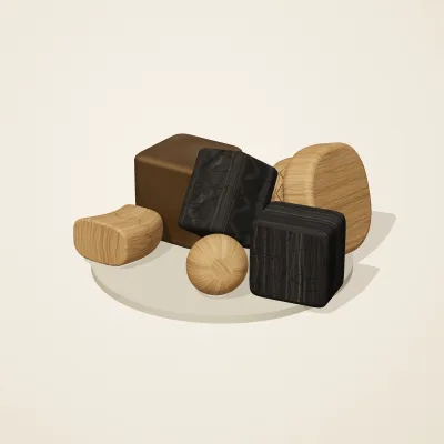 The six parts of Yoruba Woodcraft No. 40 in a loose pile on a round stand