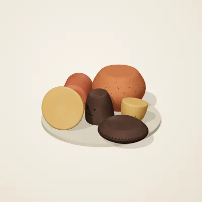 The six parts of Nok Terracotta No. 36 in a loose pile on a round stand