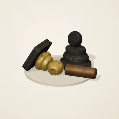 The six parts of Ashanti Goldwork No. 12 in a loose pile on a round stand
