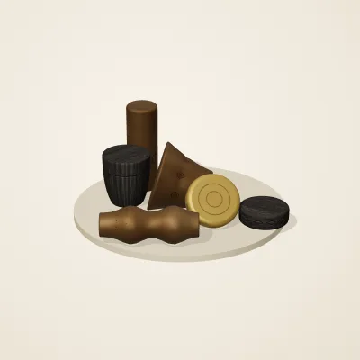 The six parts of Ashanti Goldwork No. 16 in a loose pile on a round stand