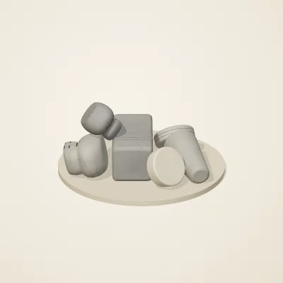 The six parts of Great Zimbabwe Stone No. 1 in a loose pile on a round stand