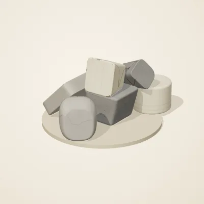 The six parts of Great Zimbabwe Stone No. 25 in a loose pile on a round stand
