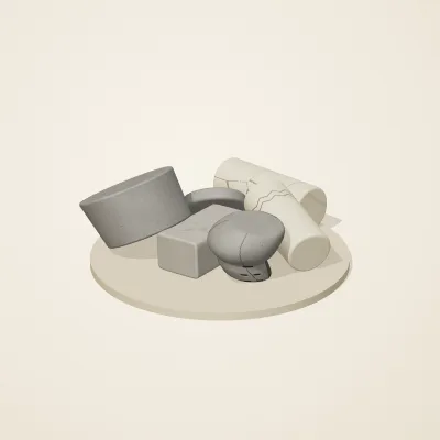 The six parts of Great Zimbabwe Stone No. 26 in a loose pile on a round stand
