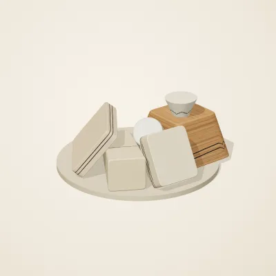 The six parts of Ndebele Geometry No. 6 in a loose pile on a round stand