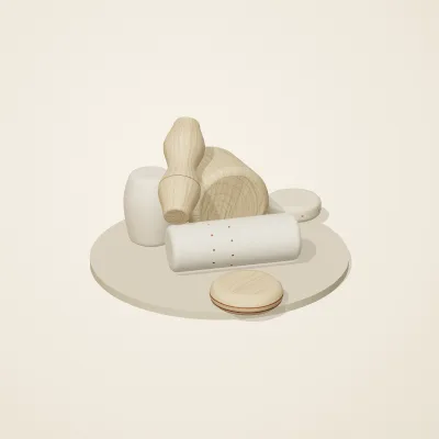 The six parts of Nordic Folk No. 29 in a loose pile on a round stand
