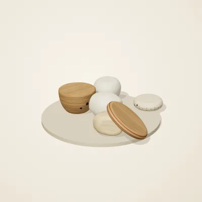 The six parts of Nordic Folk No. 33 in a loose pile on a round stand