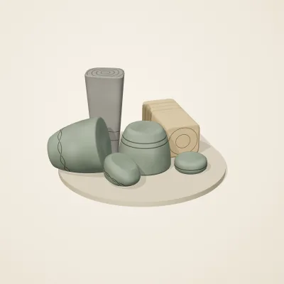 The six parts of Celtic Stonework No. 13 in a loose pile on a round stand