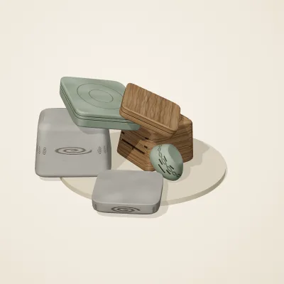 The six parts of Celtic Stonework No. 15 in a loose pile on a round stand