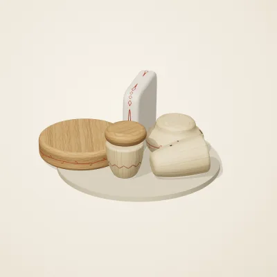 The six parts of Slavic Folk Toys No. 1 in a loose pile on a round stand
