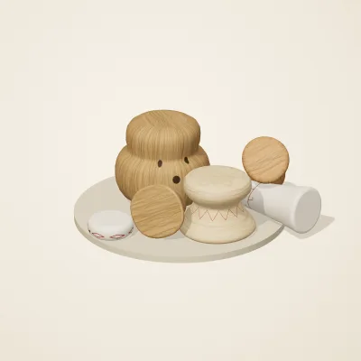 The six parts of Slavic Folk Toys No. 4 in a loose pile on a round stand