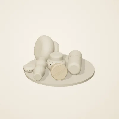 The six parts of Slavic Folk Toys No. 5 in a loose pile on a round stand