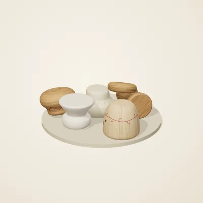 The six parts of Slavic Folk Toys No. 32 in a loose pile on a round stand