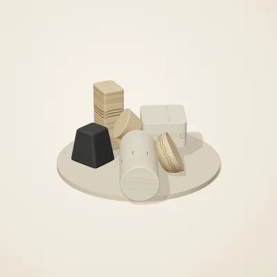The six parts of Medieval Romanesque No. 23 in a loose pile on a round stand