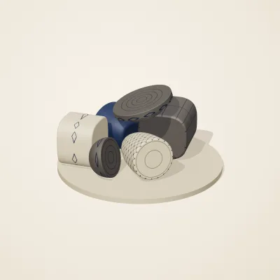 The six parts of Byzantine Mosaic No. 21 in a loose pile on a round stand