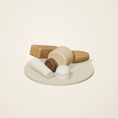 The six parts of Alpine Woodcraft No. 12 in a loose pile on a round stand