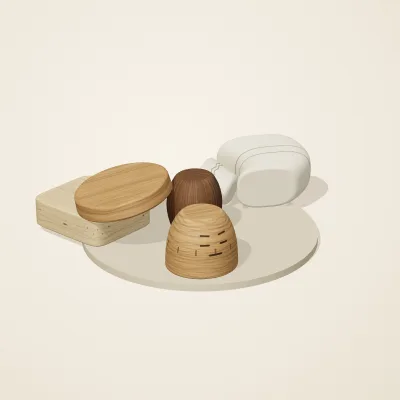 The six parts of Alpine Woodcraft No. 25 in a loose pile on a round stand