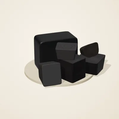 The six parts of Obsidian Temple No. 1 in a loose pile on a round stand
