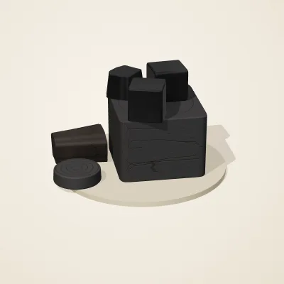 The six parts of Obsidian Temple No. 17 in a loose pile on a round stand