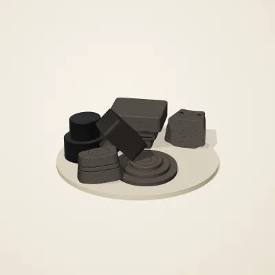 The six parts of Obsidian Temple No. 19 in a loose pile on a round stand