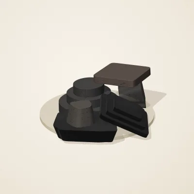 The six parts of Obsidian Temple No. 23 in a loose pile on a round stand