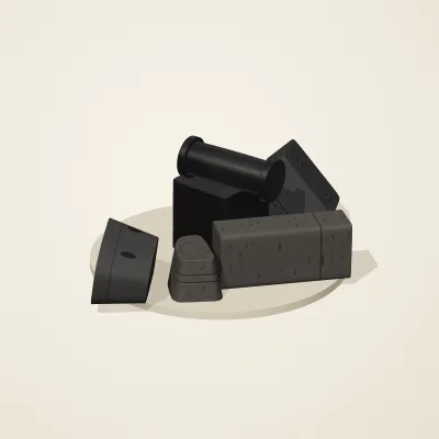 The six parts of Obsidian Temple No. 25 in a loose pile on a round stand