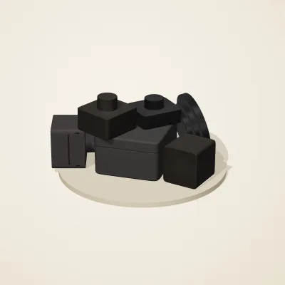 The six parts of Obsidian Temple No. 27 in a loose pile on a round stand
