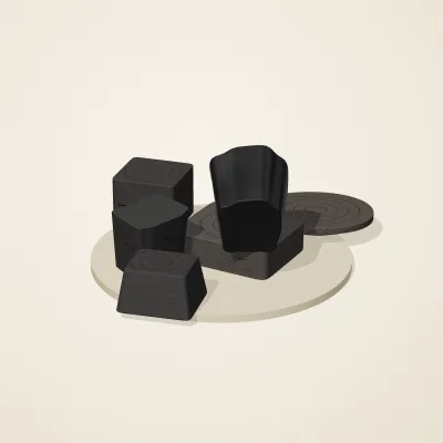 The six parts of Obsidian Temple No. 29 in a loose pile on a round stand