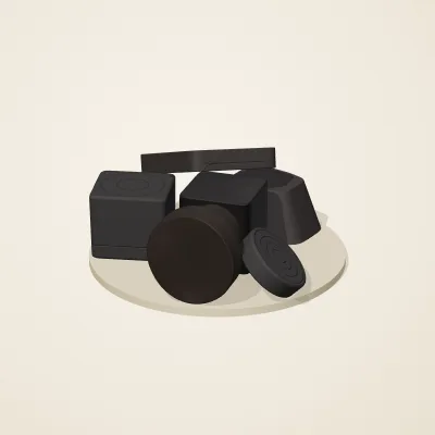The six parts of Obsidian Temple No. 40 in a loose pile on a round stand