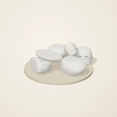 The six parts of Moonstone Oracle No. 9 in a loose pile on a round stand