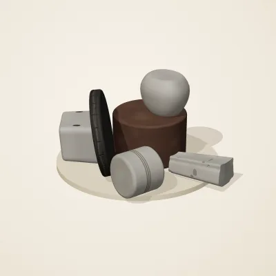 The six parts of Ashen Relics No. 1 in a loose pile on a round stand