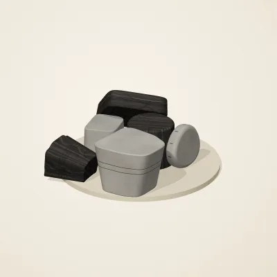 The six parts of Ashen Relics No. 5 in a loose pile on a round stand