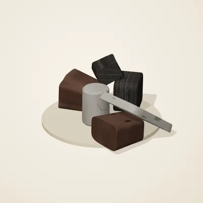 The six parts of Ashen Relics No. 6 in a loose pile on a round stand