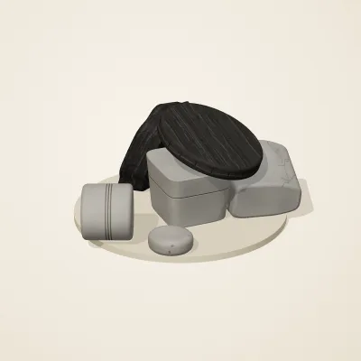 The six parts of Ashen Relics No. 27 in a loose pile on a round stand