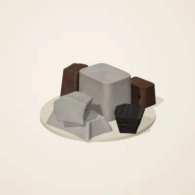 The six parts of Ashen Relics No. 30 in a loose pile on a round stand