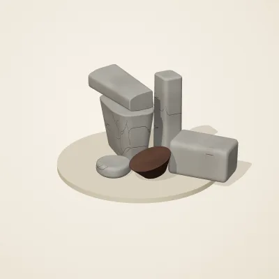 The six parts of Ashen Relics No. 35 in a loose pile on a round stand