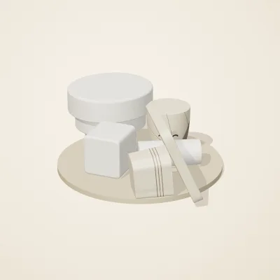 The six parts of Salt Monuments No. 3 in a loose pile on a round stand
