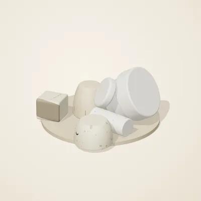 The six parts of Salt Monuments No. 5 in a loose pile on a round stand