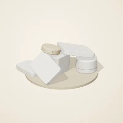 The six parts of Salt Monuments No. 9 in a loose pile on a round stand