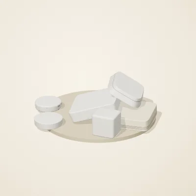 The six parts of Salt Monuments No. 12 in a loose pile on a round stand