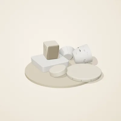 The six parts of Salt Monuments No. 13 in a loose pile on a round stand