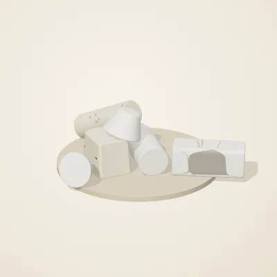 The six parts of Salt Monuments No. 15 in a loose pile on a round stand