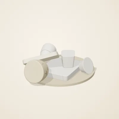 The six parts of Salt Monuments No. 21 in a loose pile on a round stand
