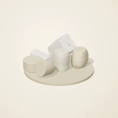The six parts of Salt Monuments No. 36 in a loose pile on a round stand