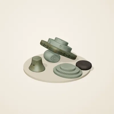 The six parts of Sunken Shrine No. 8 in a loose pile on a round stand