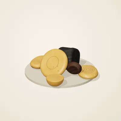 The six parts of Amber Spirits No. 4 in a loose pile on a round stand